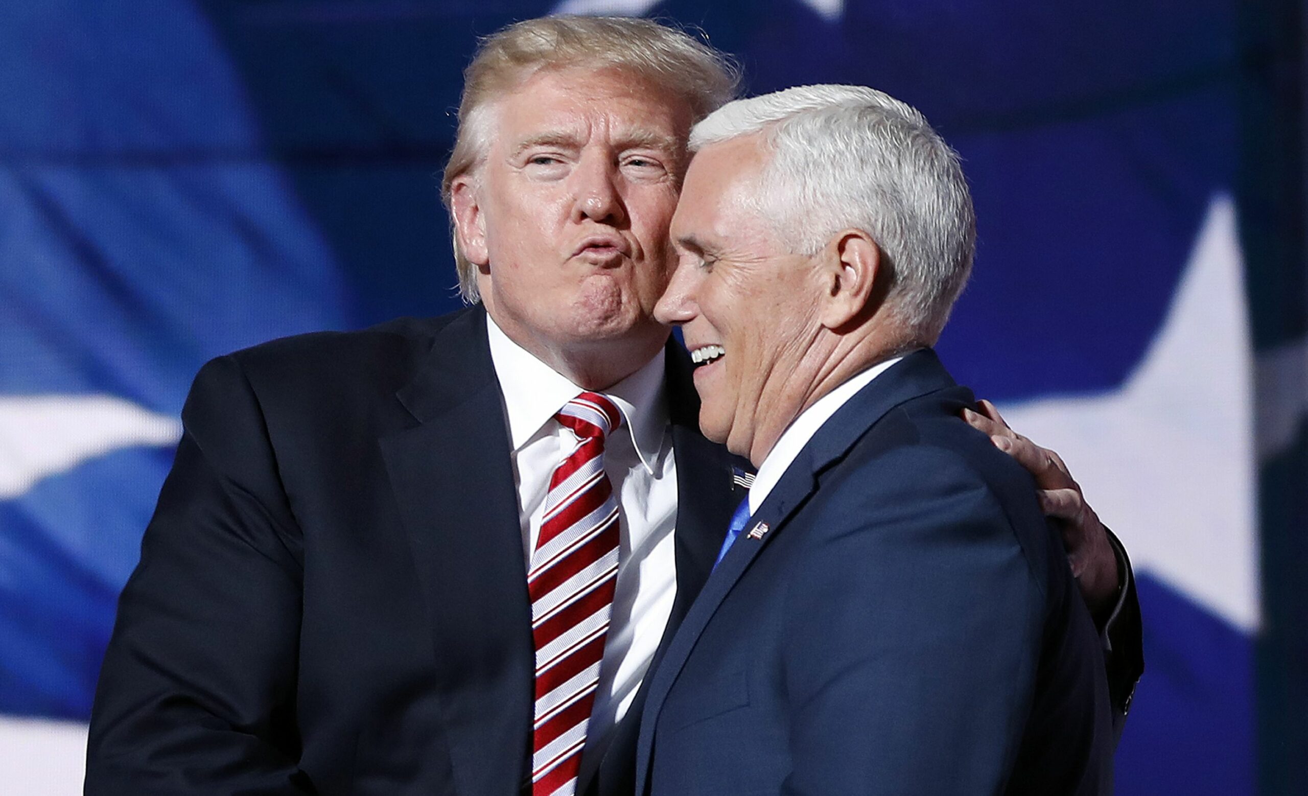 Donald Trump and Mike Pence embrace each other