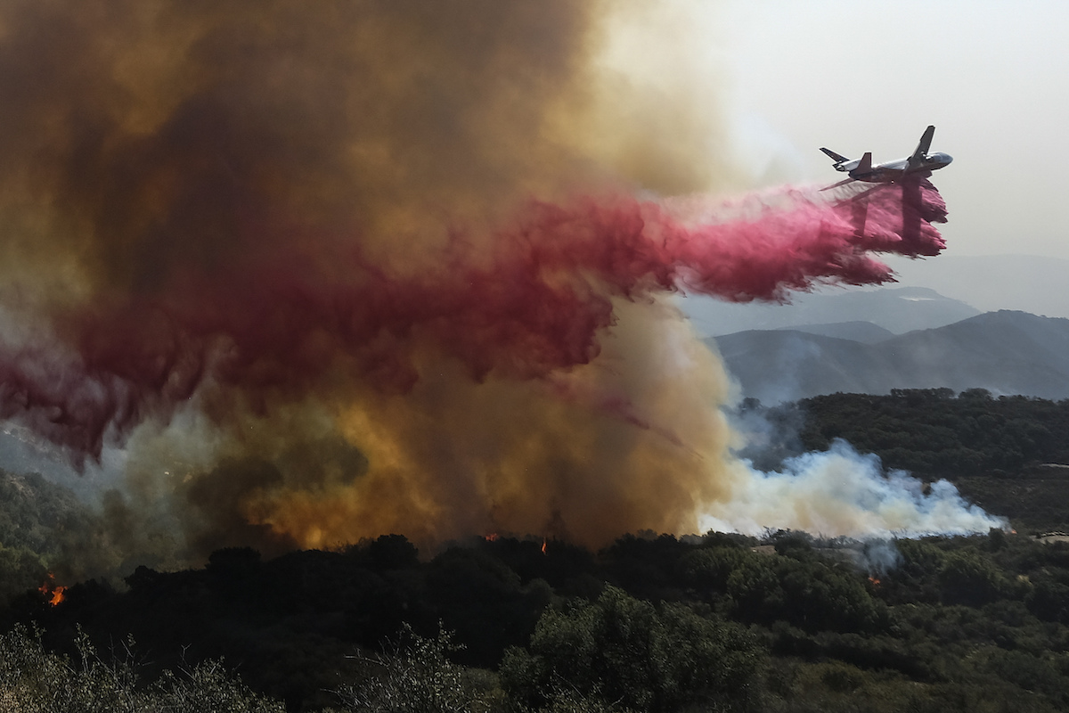 California wildfire plane drops retardant