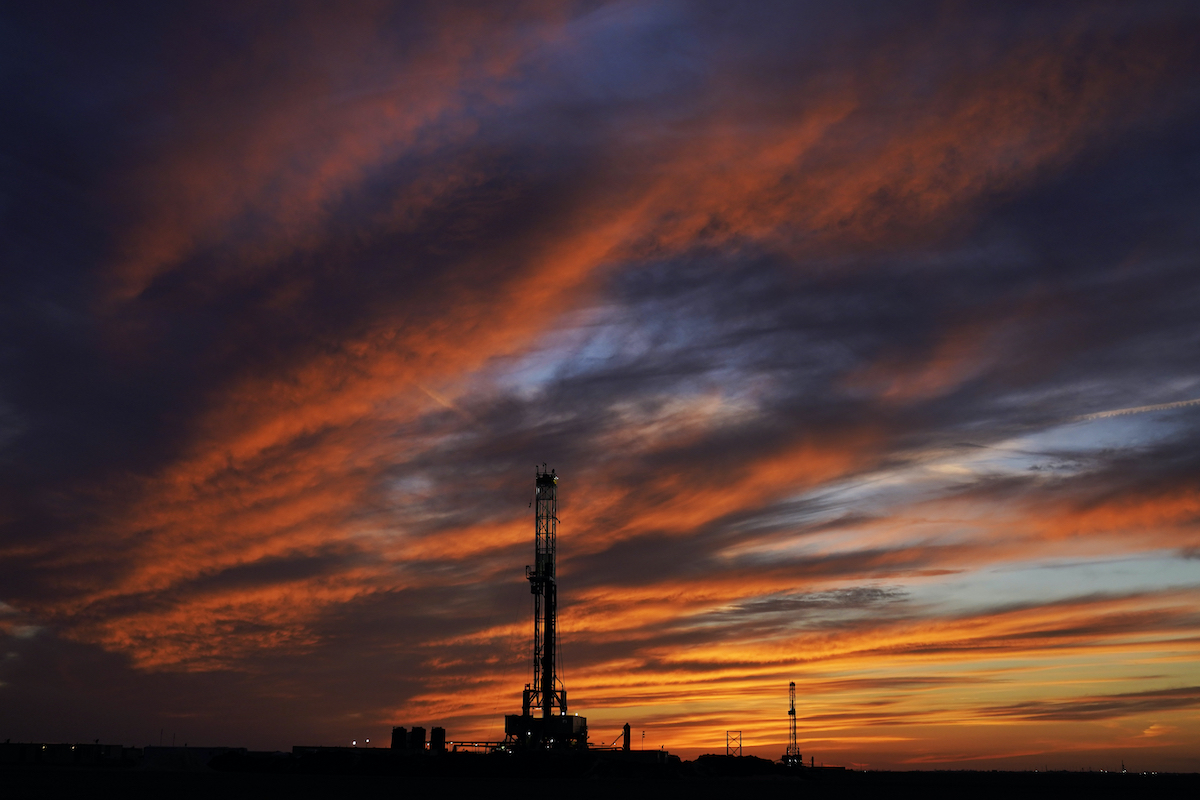 Oil drilling at sunset in Oklahoma March 7, 2022