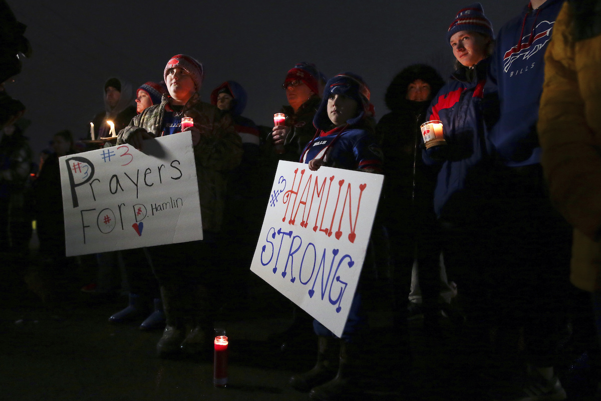 People attend vigil for Damar Hamlin in Orchard Park NY, 2023