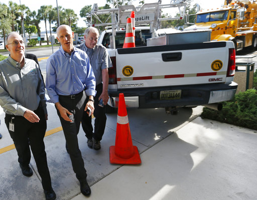 Rick Scott and FDOT truck in Fort Lauderdale 2018