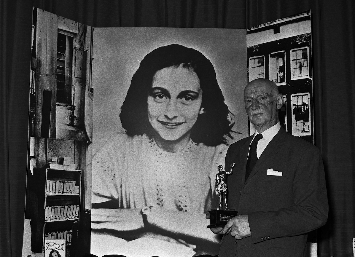 Otto Frank with photo of Anne Frank