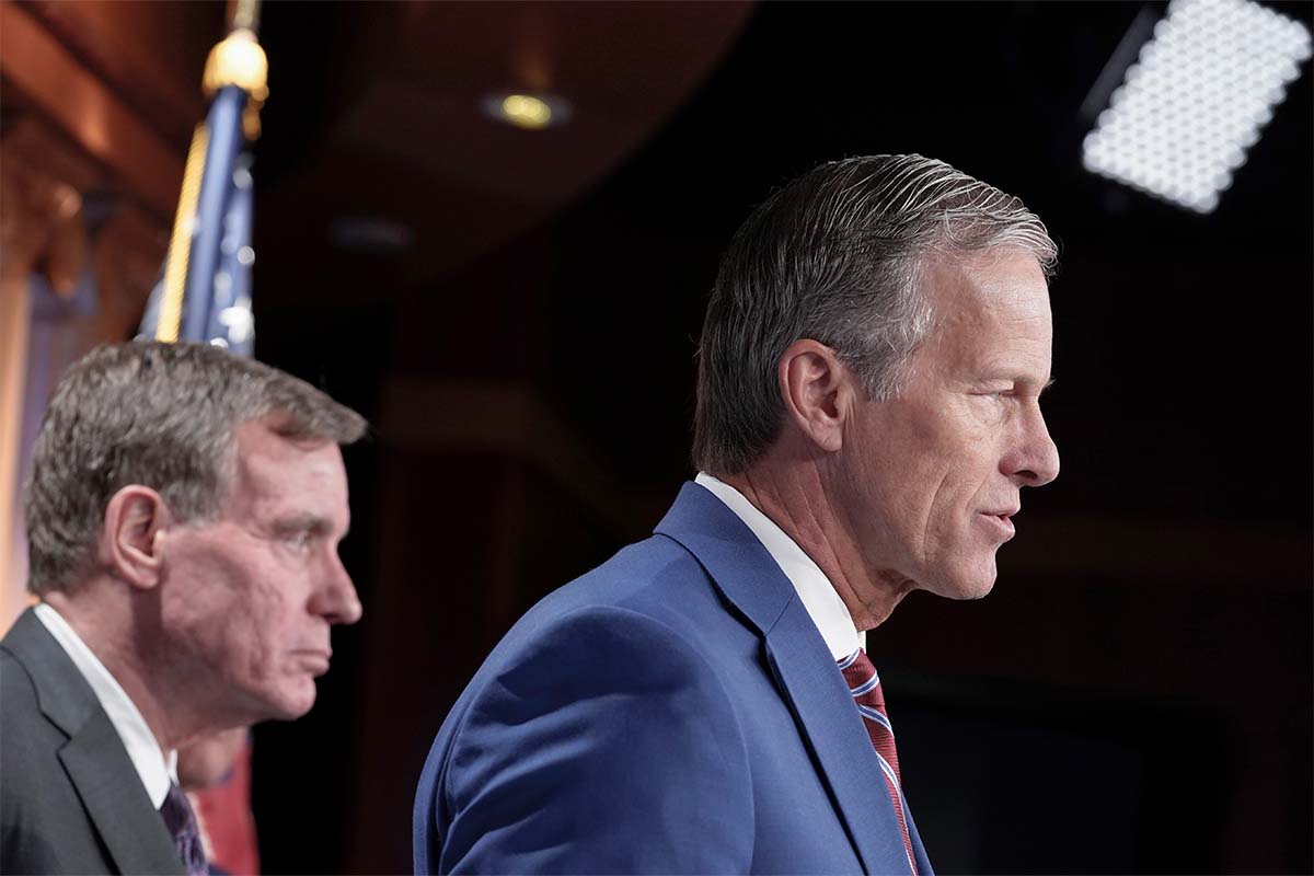 Sens. Jon Thune and Mark Warner at RESTRICT Act hearing,, 3-7-2023