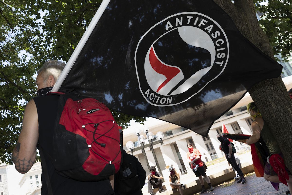 Antifa protestors holding a flag 07-11-2020
