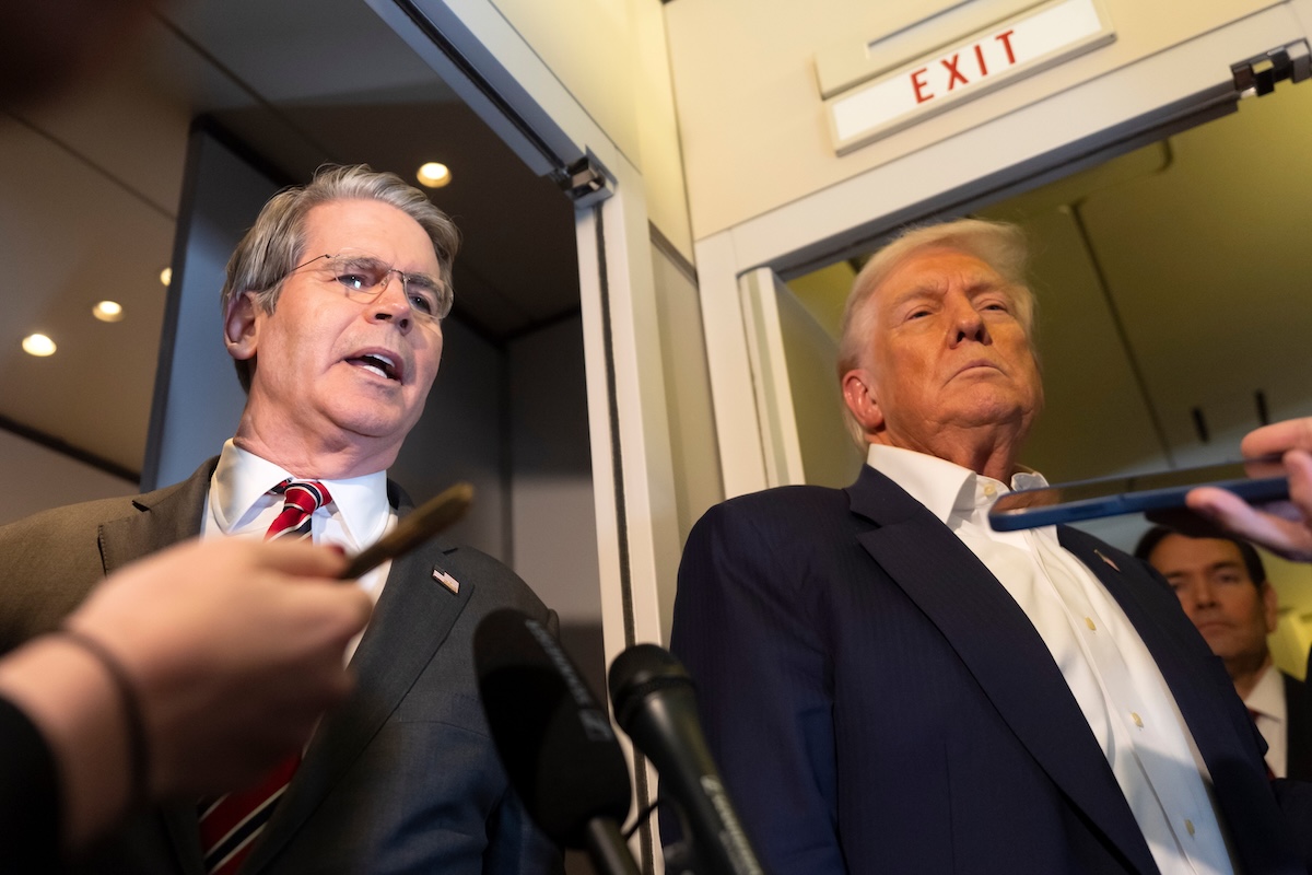 Scott Bessent and Donald Trump on Air Force One in Asia