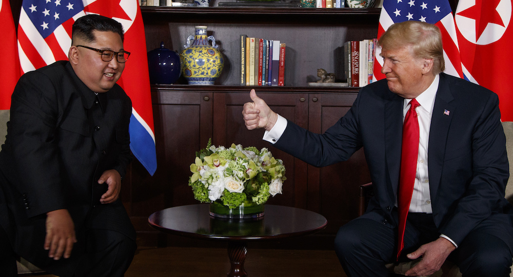 Trump thumbs up Kim Singapore