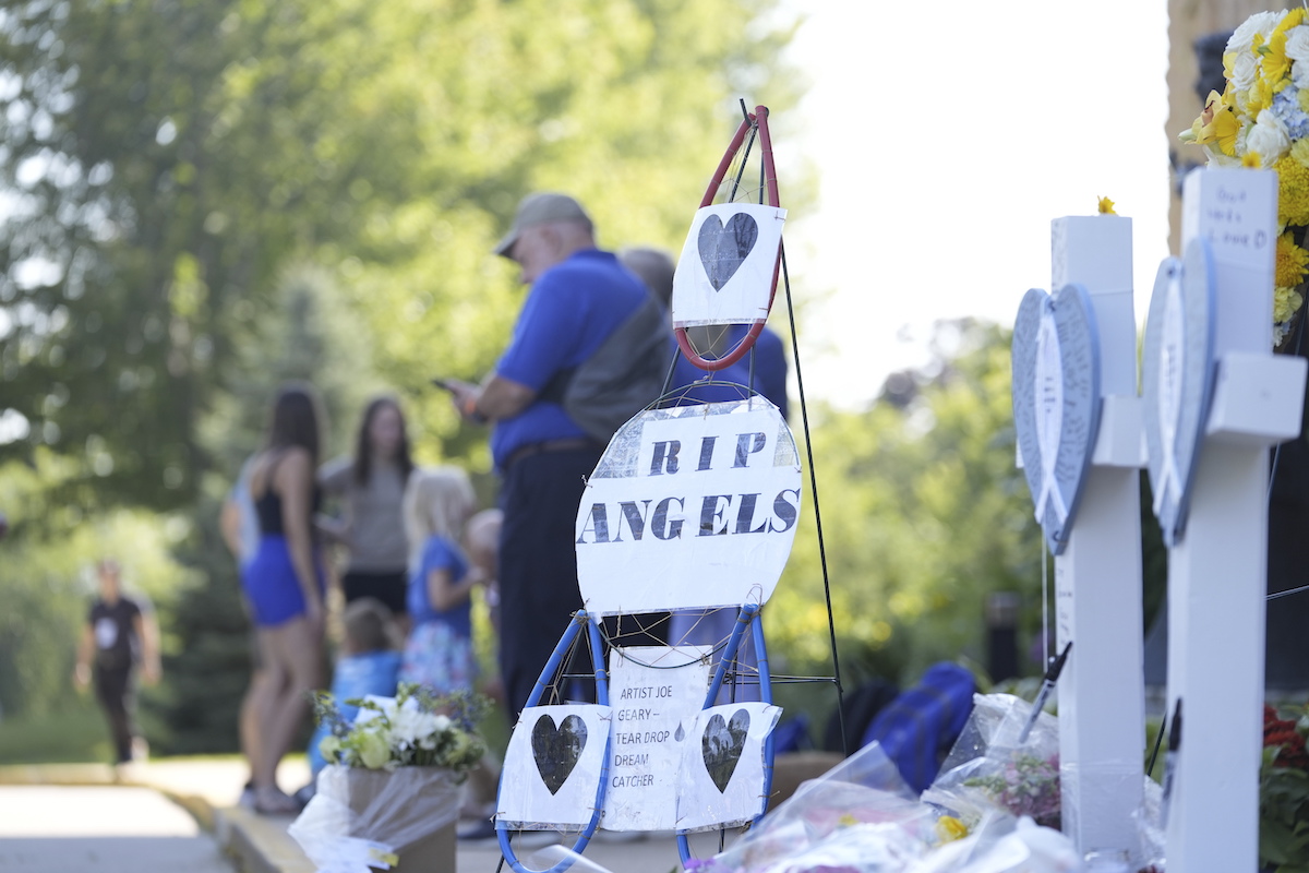 Annunciation Minneapolis school shooting RIP and two crosses 8-28-25