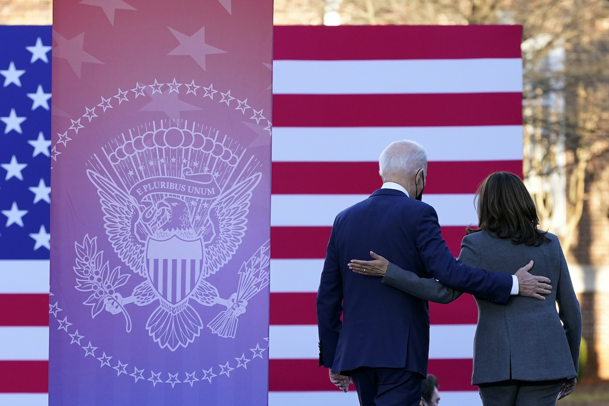 Biden and Harris by huge flag in Atlanta 1-11-22