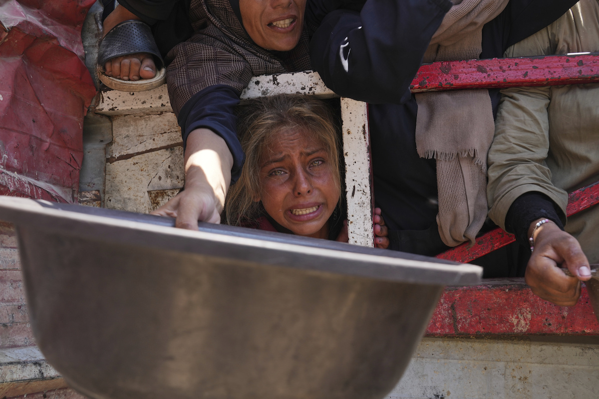 Gaza City food kitchen, child crying, 6/26/25