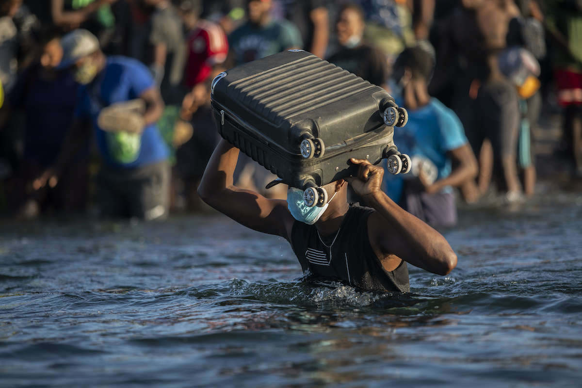 Haitian migrants wade across river back to Mexico 9-20-21