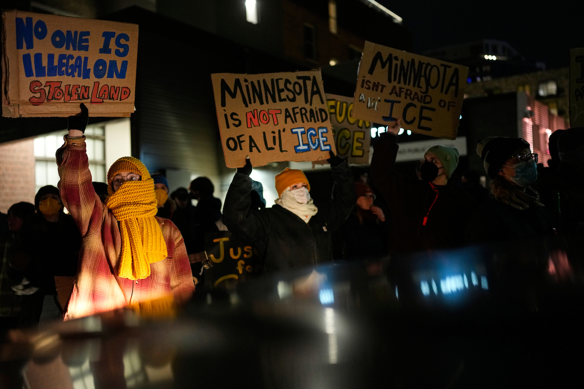 Minneapolis anti ICE protest cardboard signs 1-9-26