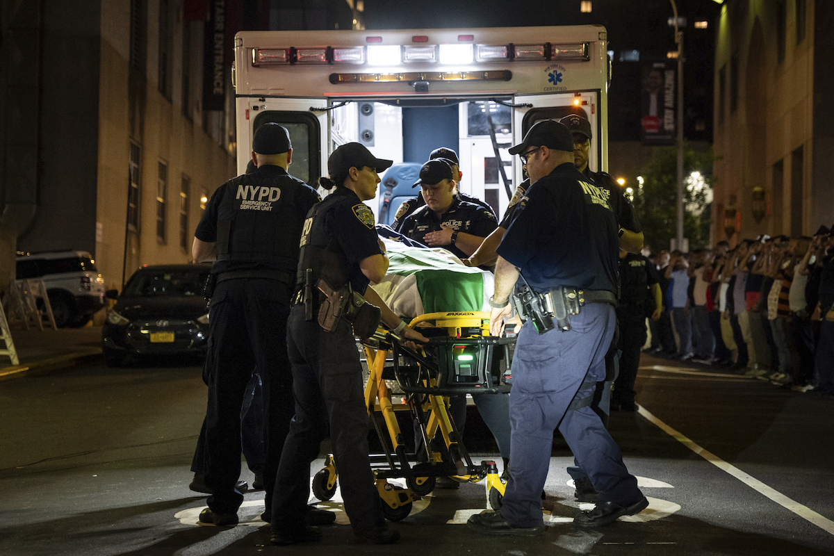 NYPD with slain officer and ambulance 7-29-25