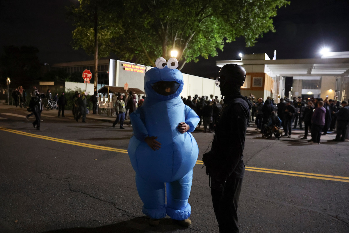 Protest in blue costume Portland Oregon 10-3-25