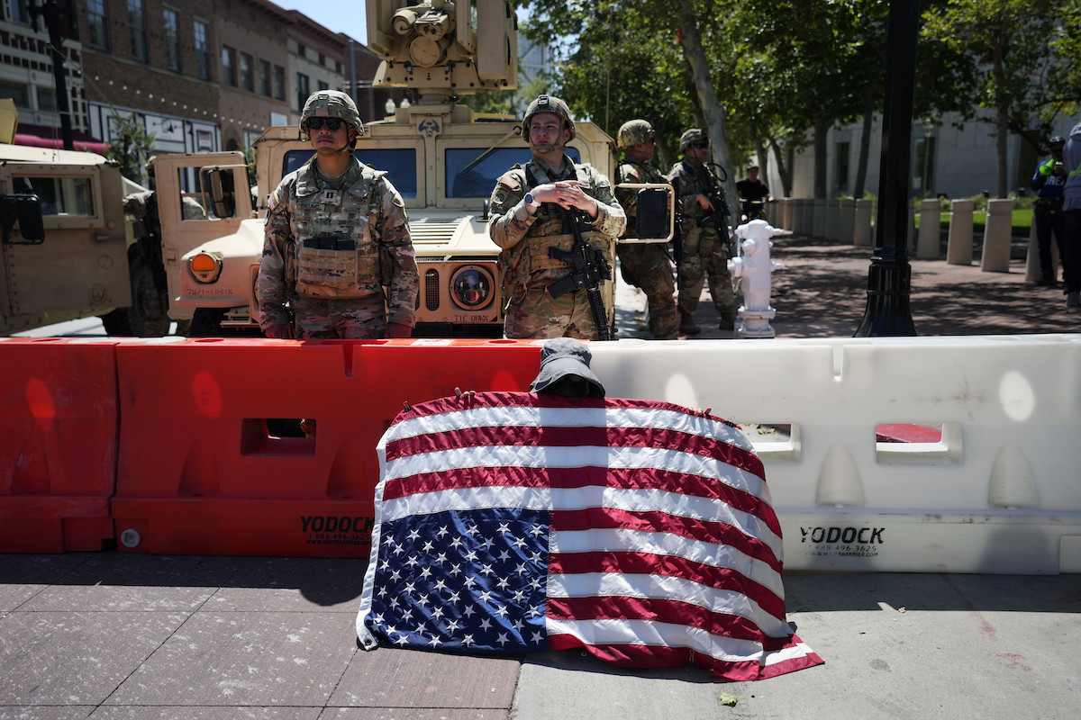 National Guard w/protester June 10, 2025
