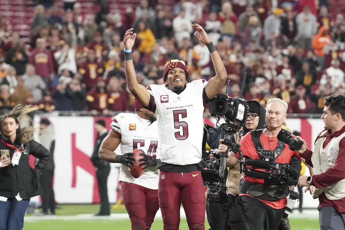 Washington Commanders quarterback Jayden Daniels (5) celebrates 01-12-2025