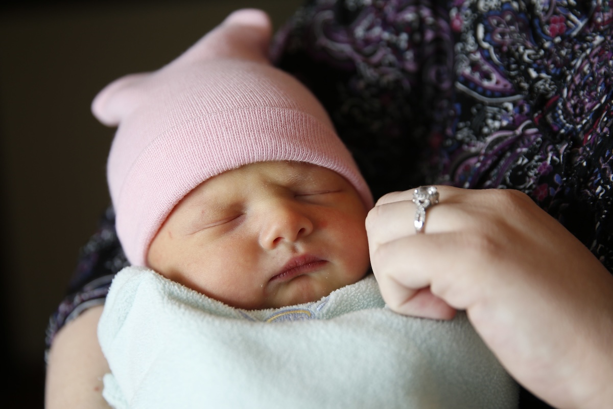 Generic baby in pink cap