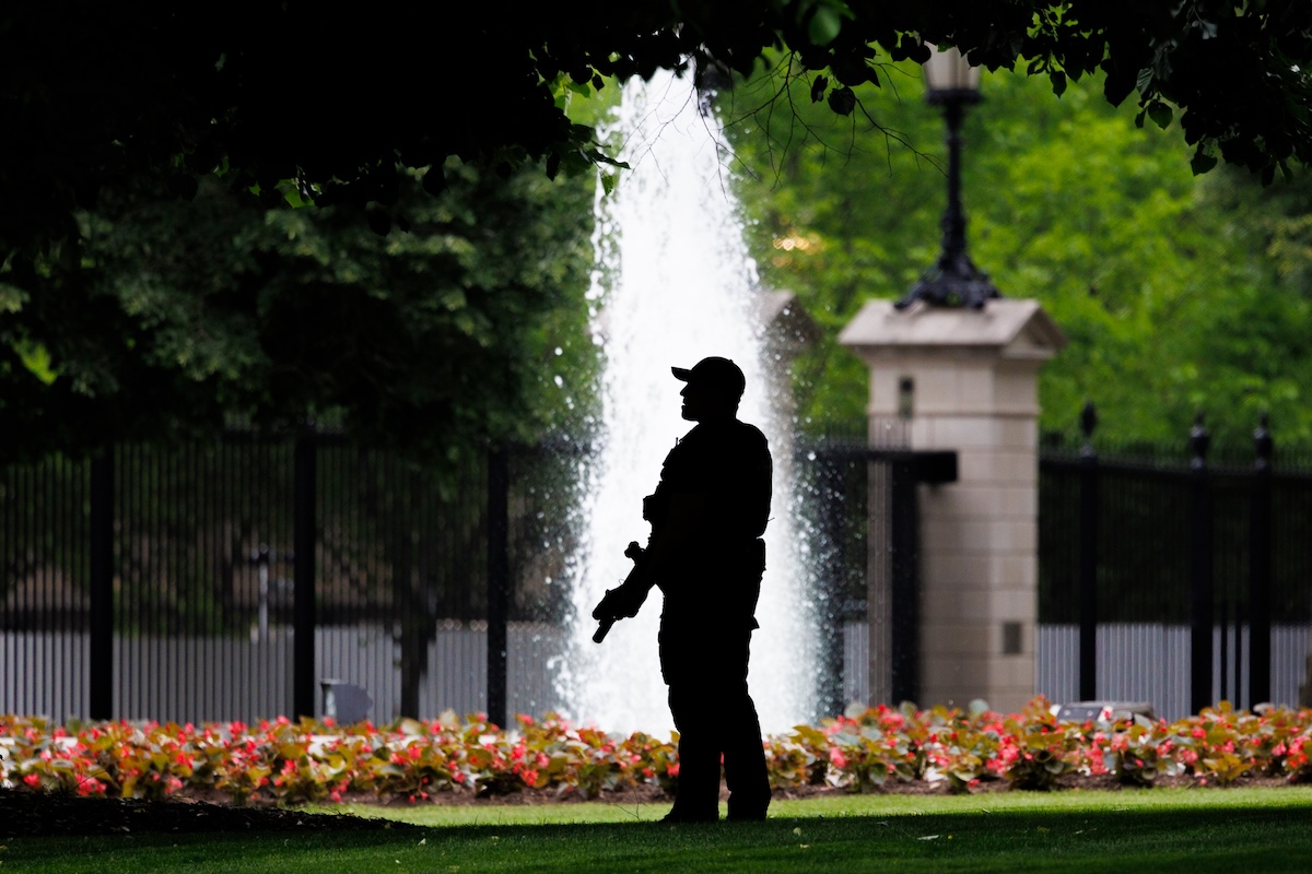Secret Service standing guard near fountain