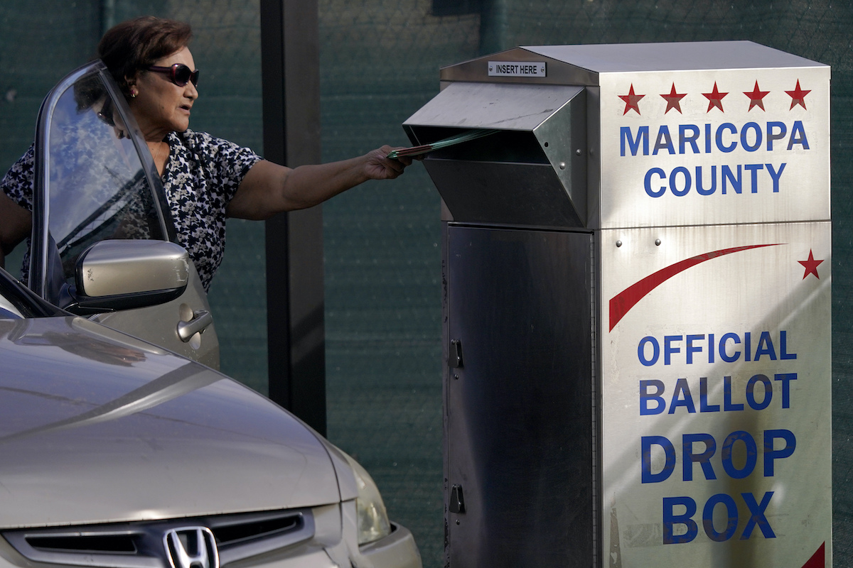 Maricopa Arizona voter at drop box 11-1-22 AP