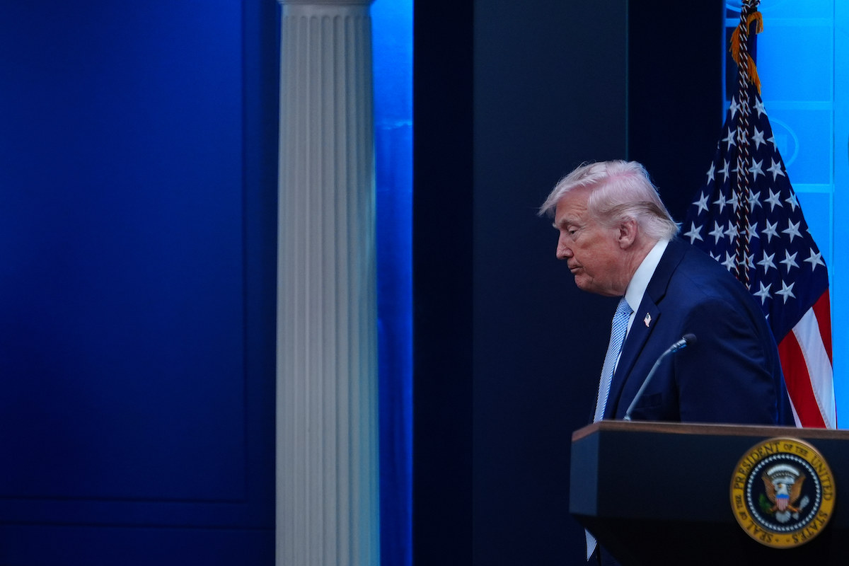 Trump side profile at news conference 4-6-26
