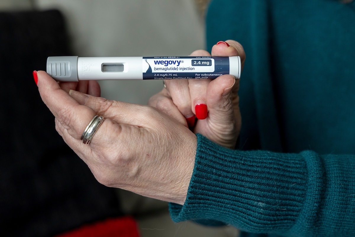 Wegovy GLP-1 injection pen held up March 2024