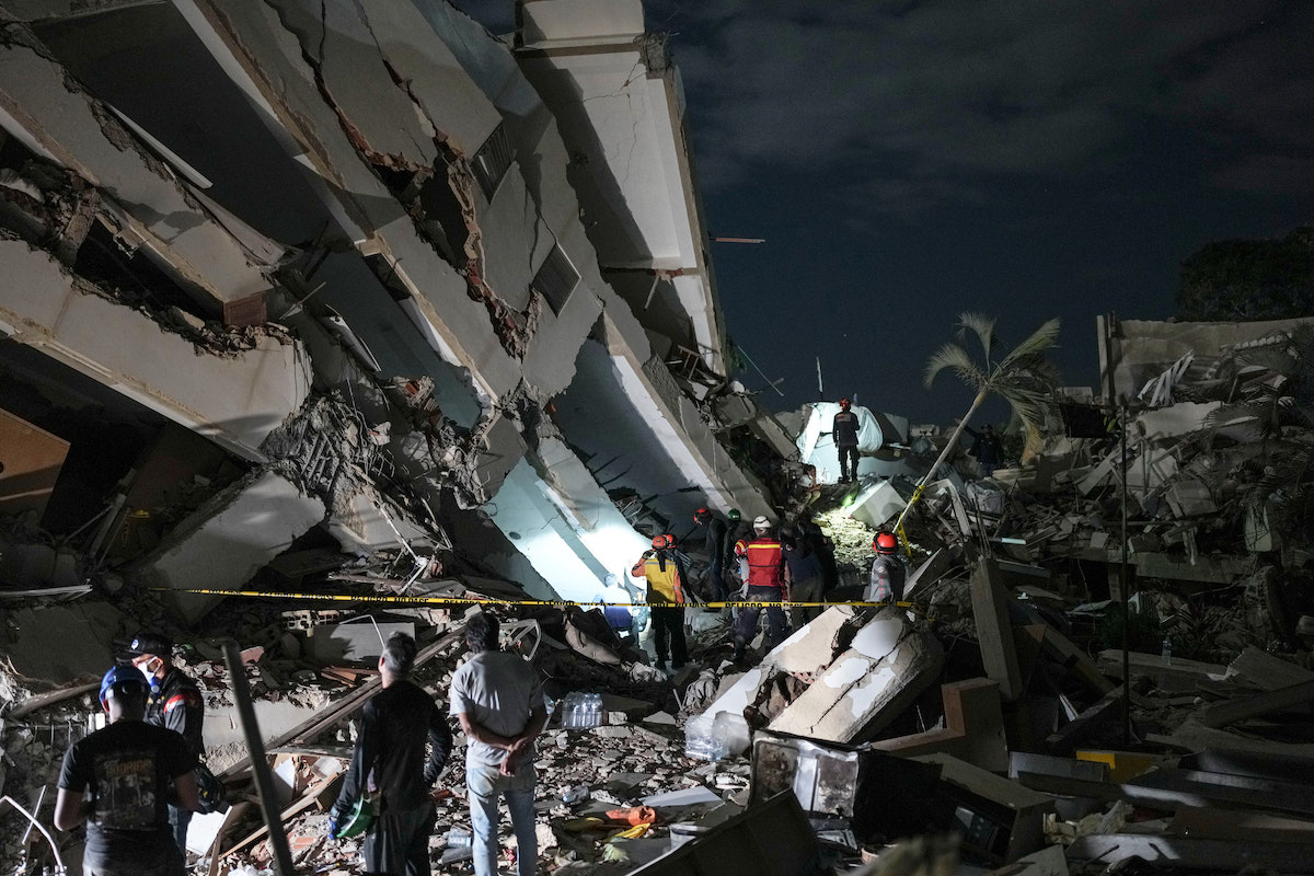 Rescue workers at rubble from Venezuela's earthquakes 06-29-26